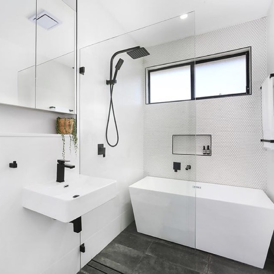 A stylish, budget-friendly living room design with a calculator and schedule