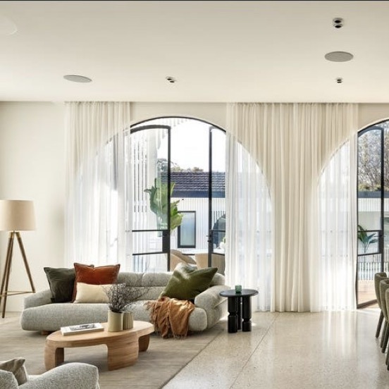 Interior designer working on a stylish room layout and a staged property for sale