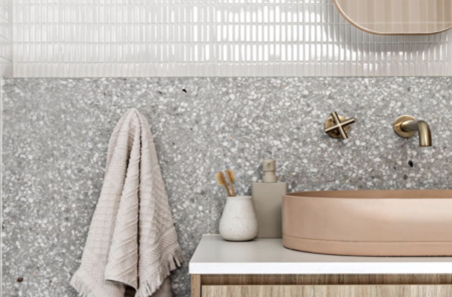 A modern, stylish living room with a large window and a view of the city skyline